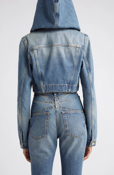 Shop Alaïa Hooded Crop Denim Jacket In Bleu Vintage