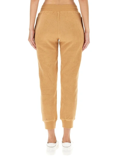 Shop Moschino Jogging Pants With Logo In Beige