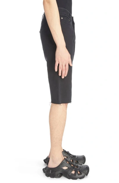 Shop Balenciaga Slim Fit Distressed Denim Cutoff Shorts In Pitch Black