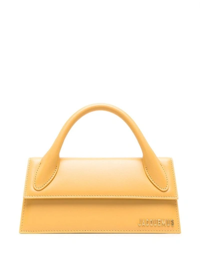 Shop Jacquemus Le Chiquito Long Handbag In Yellow