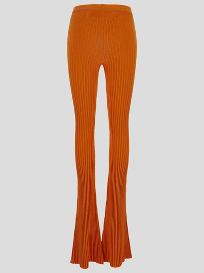 Shop Andrea Adamo Andreadamo Trousers In <p>andreadamo Orange Trousers With Ribbed Texture