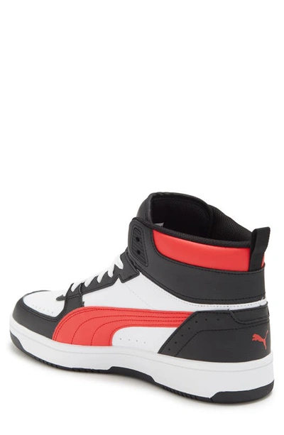 Shop Puma Rebound Joy High Top Sneaker In White Red Black