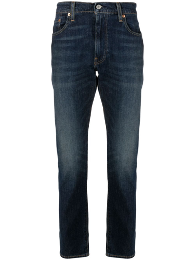 Shop Levi's 502™ Low-rise Tapered Jeans In Blau