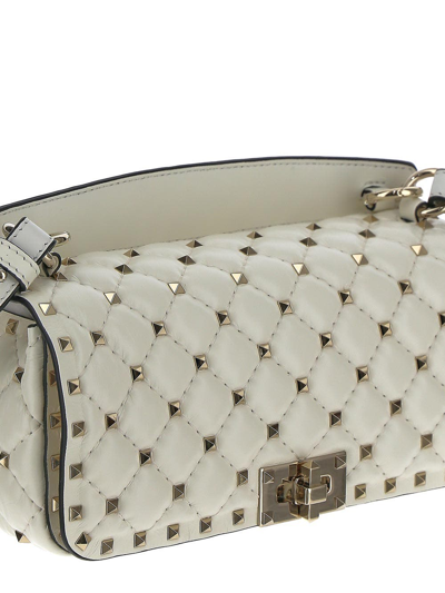 Shop Valentino Rockstud Spike Shoulder Bag In Ivory