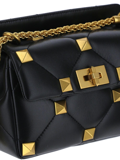 Shop Valentino Roman Stud Small Shoulder Bag In Black