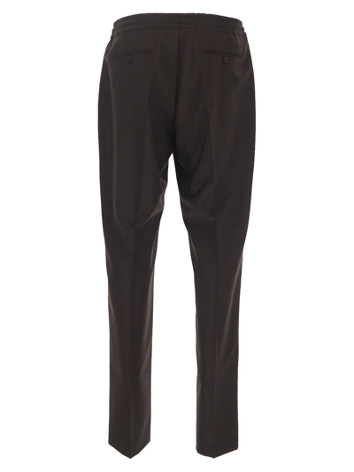 Shop Valentino Tapered-leg Trousers In Brown
