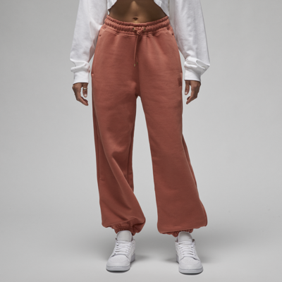 Shop Jordan Women's  Flight Fleece Pants In Orange