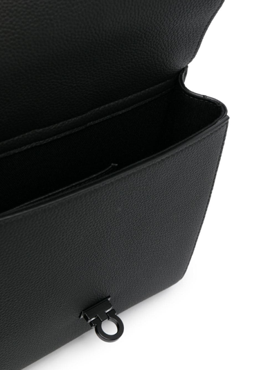 Shop Ferragamo Asymmetric Faux-leather Messenger Bag In Black