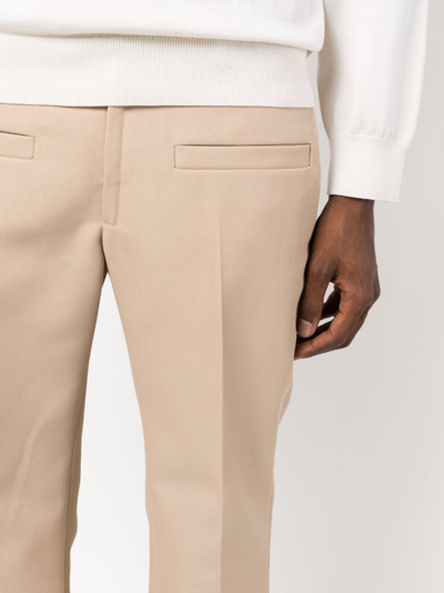 Courrèges Pressed-crease Cropped Trousers In Neutrals