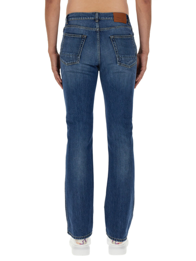 Shop Alexander Mcqueen Jeans Bootcut In Blu