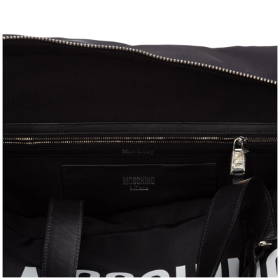 Shop Moschino Logo Printed Duffle Bag In 2555