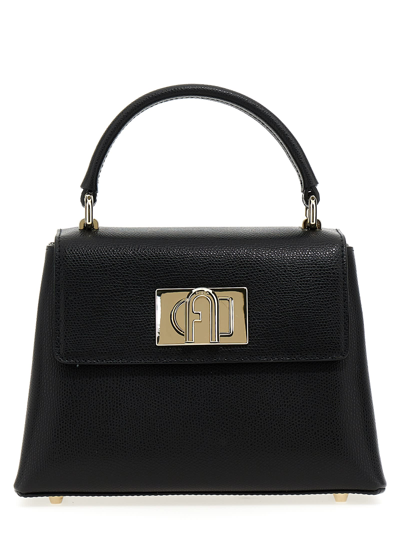 Shop Furla 1927 Mini Handbag In Black
