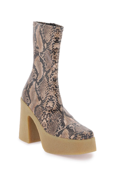 Shop Stella Mccartney Skyla Wedge Ankle Boots In Alter Python In Coffee (brown)