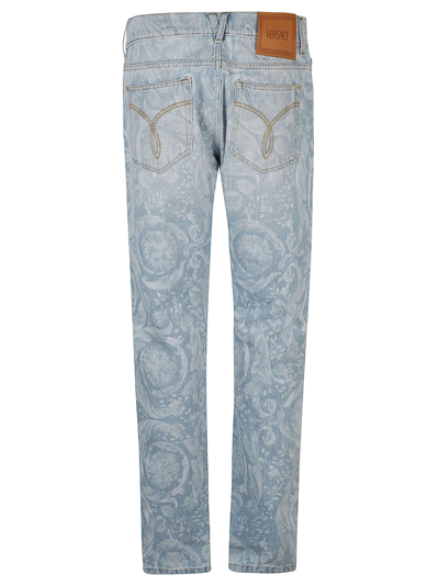 Shop Versace All-over Jeans In Light Blue