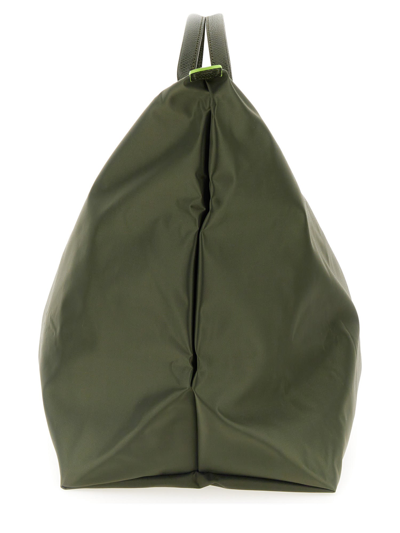 Shop Longchamp Le Pliage Travel Bag In Verde