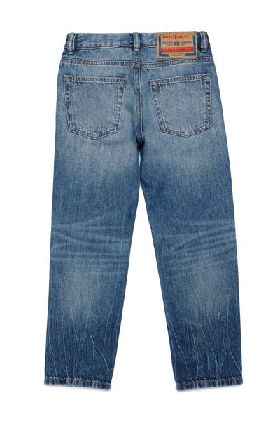 Shop Diesel 2010-j Trousers  2010 Blue Straight Jeans With Abrasions And Tears In Denim Blue