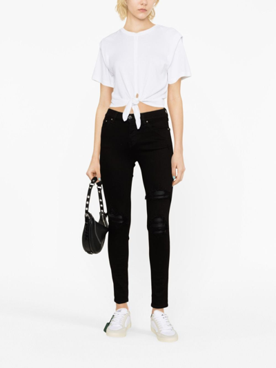 Shop Amiri Mx1 Leather-trimmed Distressed Skinny Jeans In Black