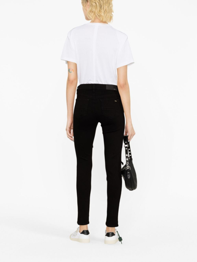 Amiri Mx1 Leather-trimmed Distressed Skinny Jeans In Black