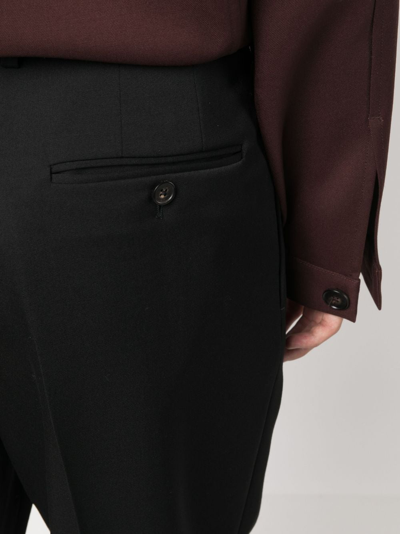 Shop Lanvin Straight-leg Pleated Wool Trousers In Black