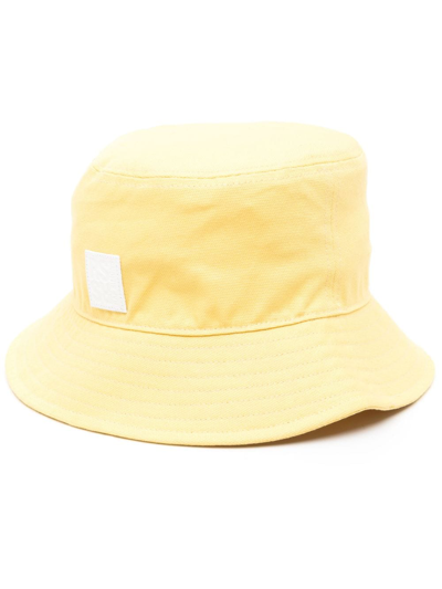 Shop Raf Simons Logo-patch Bucket Hat In Yellow