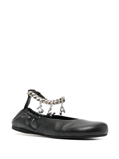Shop Jw Anderson Logo-charm Leather Ballerina Shoes In Black