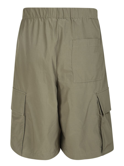 Shop Off-white Shorts In Green