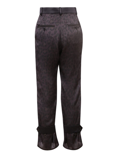 Sacai Leopard Print Trousers In Black