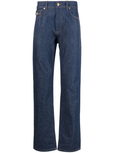 Shop Versace Medusa Head-detailed Straight-leg Jeans In Blue