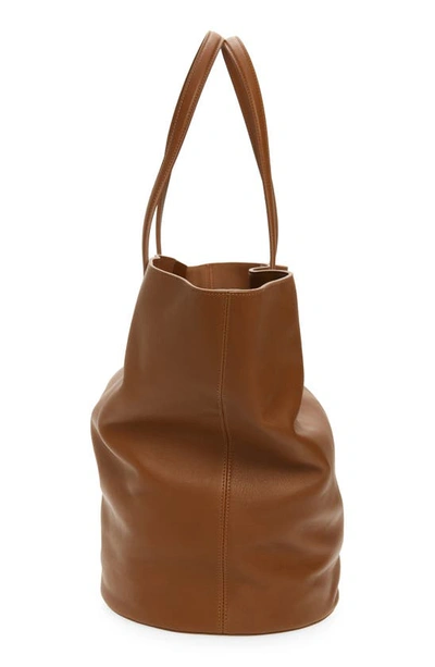 Shop Khaite The Medium Osa Leather Tote In Brown