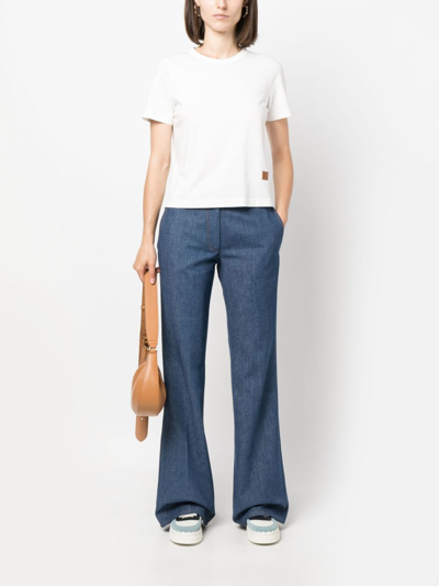 Forte Forte Mid-rise Cotton Flared Jeans In Blue