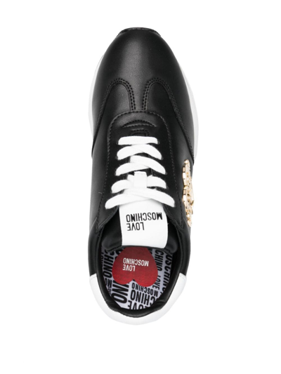 Shop Love Moschino Logo-plaque Low-top Sneakers In Black