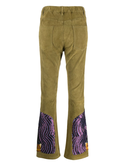 Shop Paula Motif-embroidered Flared Trousers In Green
