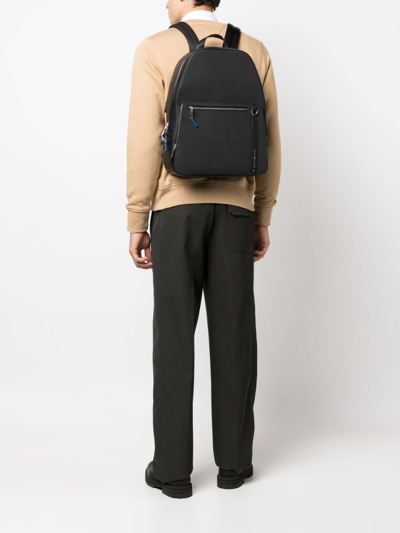 Shop Tommy Hilfiger Logo-strap Leather Backpacks In Black