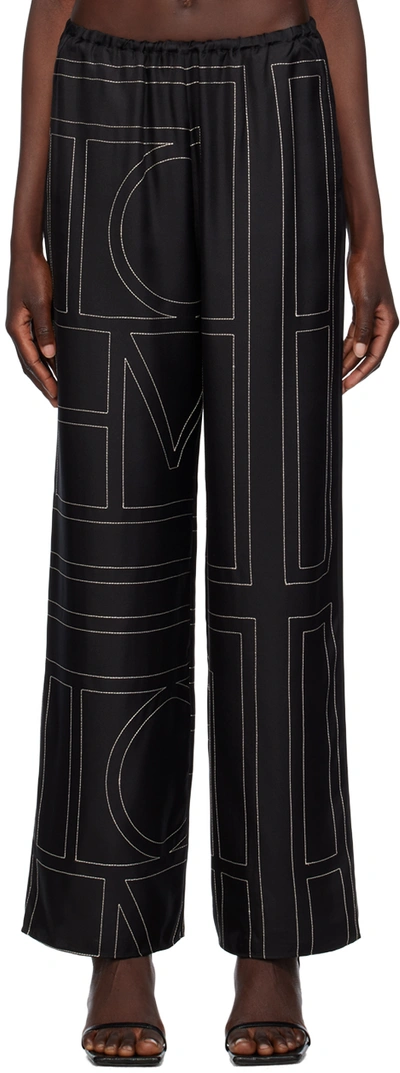 Shop Totême Black Monogram Lounge Pants In 925 Black Monogram