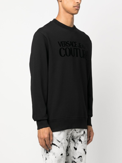 Shop Versace Jeans Couture Debossed-logo Cotton Sweatshirt In Black