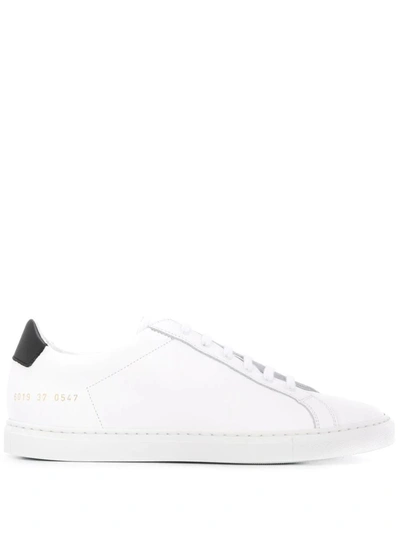 Shop Common Projects Trainers In White Black