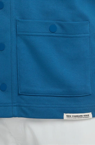 Shop Nike Dri-fit Standard Issue Golf Cardigan In Industrial Blue/ Black