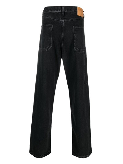 Shop Filippa K Loose-cut Leg Cotton Jeans In Black