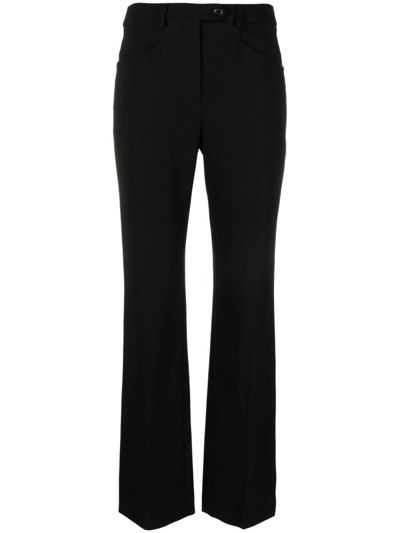 Shop Moschino Trousers In Black