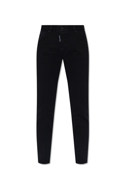 Shop Dsquared2 Logo Patch Tapered Leg Jeans In Black