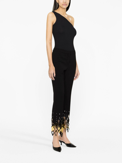 Shop Paco Rabanne Studded-ankles Cropped Trousers In Black