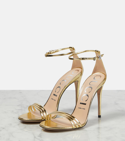 Shop Gucci Metallic Leather Sandals In Gold