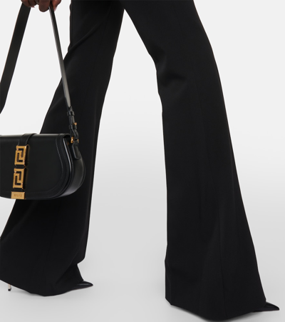 Versace Black Flared Tailored Low Waisted Pants In Stretch Wool Woman In Black
