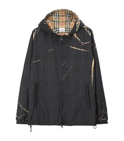 Shop Burberry Zip-front Sliced Check Windbreaker Jacket In Black