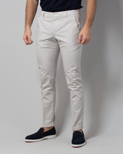Shop Dondup Trousers In White