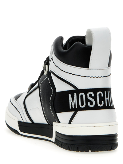 Shop Moschino Kevin Sneakers In White/black