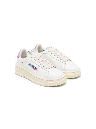 Shop Autry Panelled Lace-up Sneakers In White