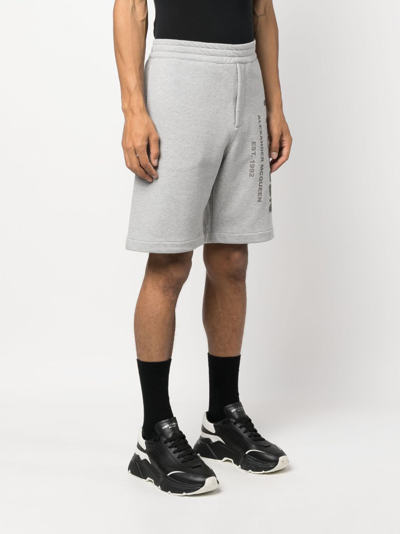 Alexander Mcqueen Alexander Mc Queen Bermuda Shorts With Graffiti Logo Print In Grey