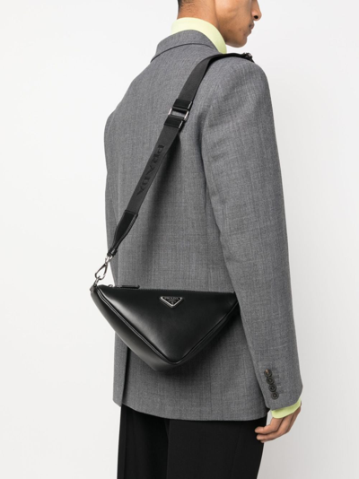 Prada Triangle Logo Plaque Crossbody Bag In Black