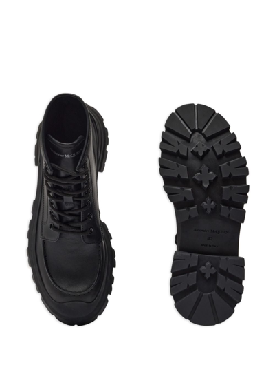 Shop Alexander Mcqueen Logo-embossed Leather Combat Boots In Black
